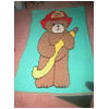 Deb Hammond's afghan of Fireman Bear in thumbnail